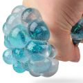 Bild von GLITTER SQUISHY MESH BALL, Netzball mehrfarbig, ca.7cm, Display - VE 12